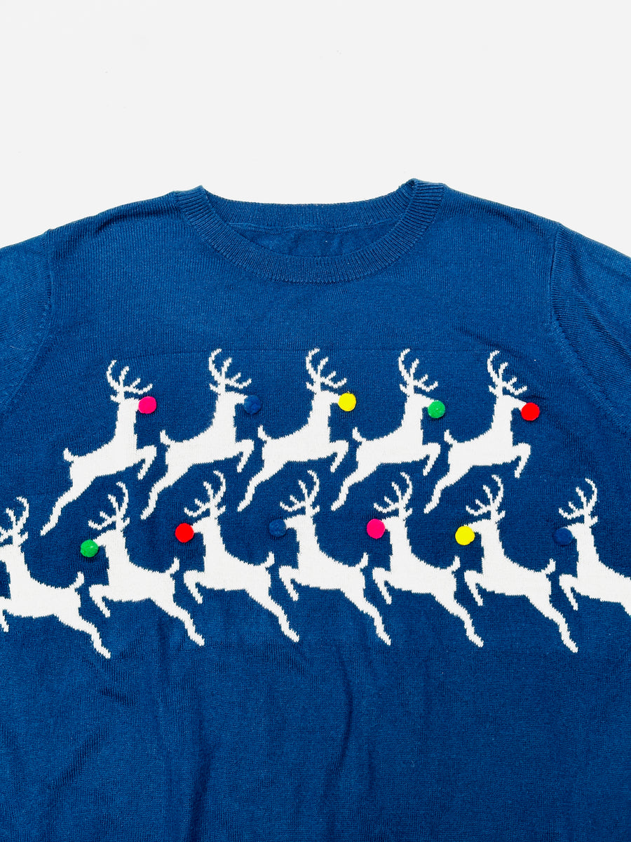 Ez a pulóver, egy használt darab a Szputnyik Shop gondosan válogatott vintage kollekciójából, amely már őrzi a karácsony varázslatos hangulatát. Ajándékozd meg a bolygót azzal, hogy idén egy preloved darabot vásárolsz!