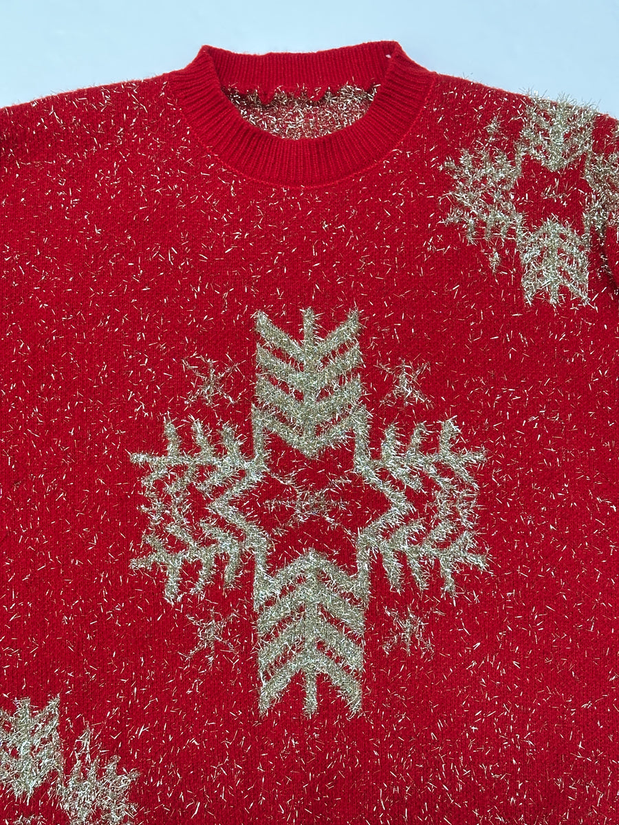 Ez a pulóver, egy használt darab a Szputnyik Shop gondosan válogatott vintage kollekciójából, amely már őrzi a karácsony varázslatos hangulatát. Ajándékozd meg a bolygót azzal, hogy idén egy preloved darabot vásárolsz!