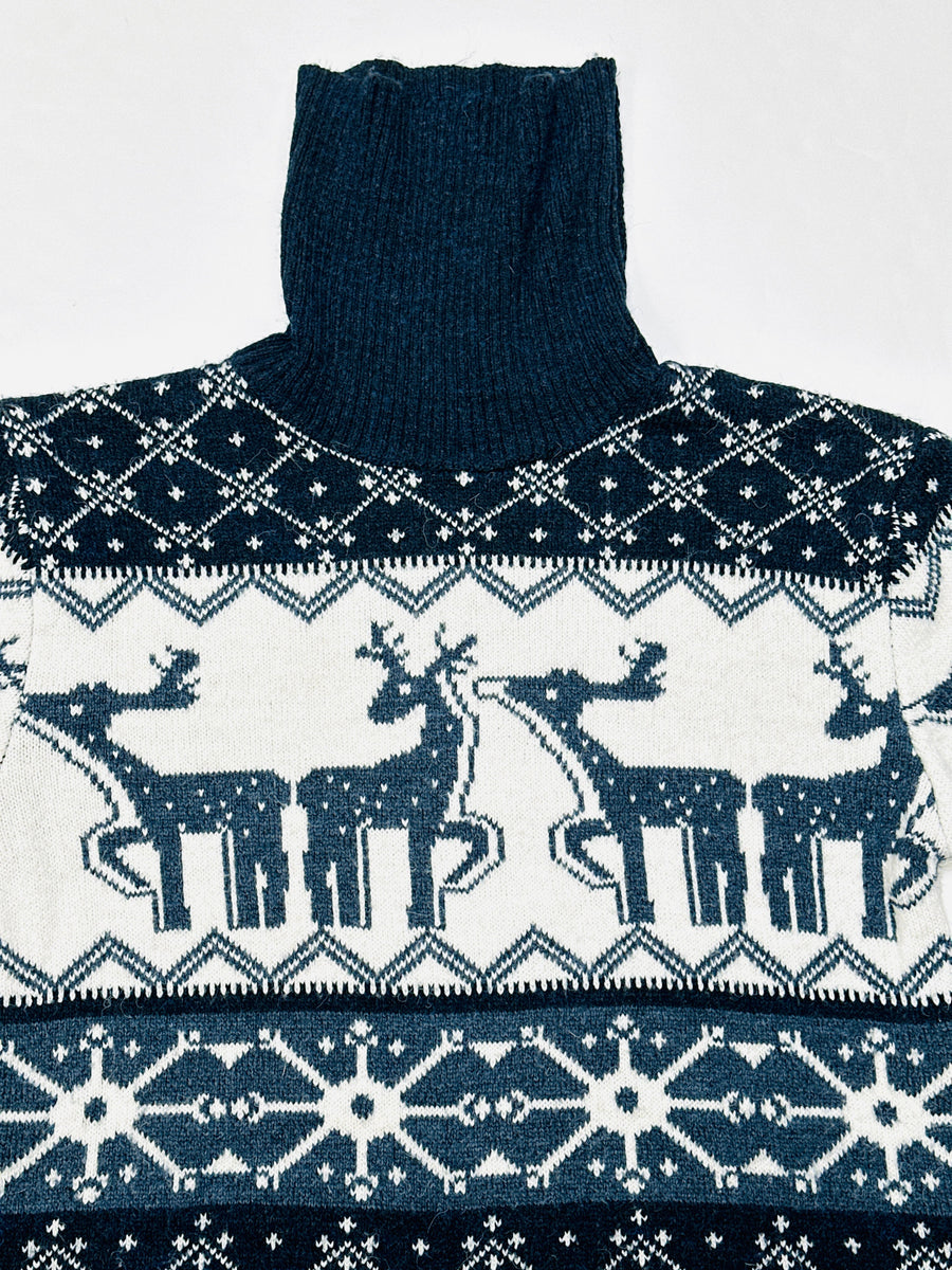 Ez a pulóver, egy használt darab a Szputnyik Shop gondosan válogatott vintage kollekciójából, amely már őrzi a karácsony varázslatos hangulatát. Ajándékozd meg a bolygót azzal, hogy idén egy preloved darabot vásárolsz!