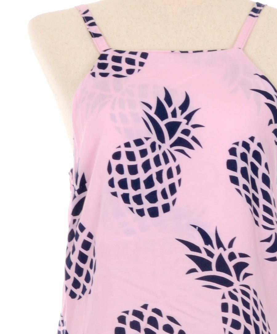 Nyári ruha rózsaszín alapon kék ananász mintával.