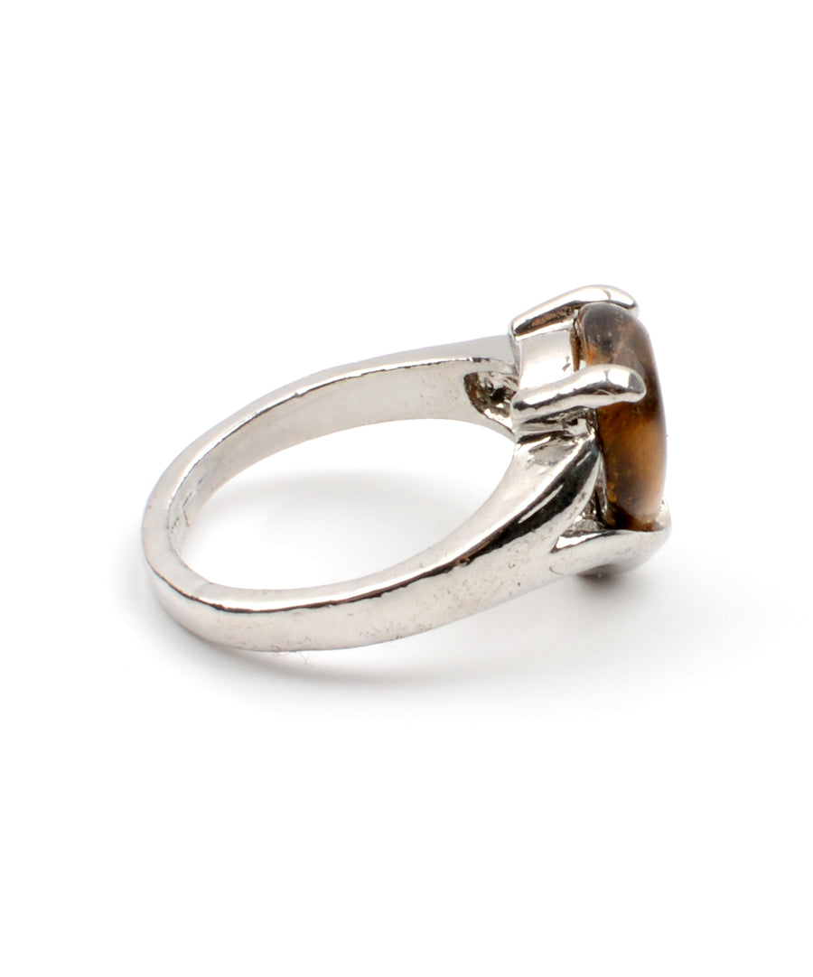 Filigrán ezüst gyűrű, tigrisszem-szerű műgyanta dísszel.