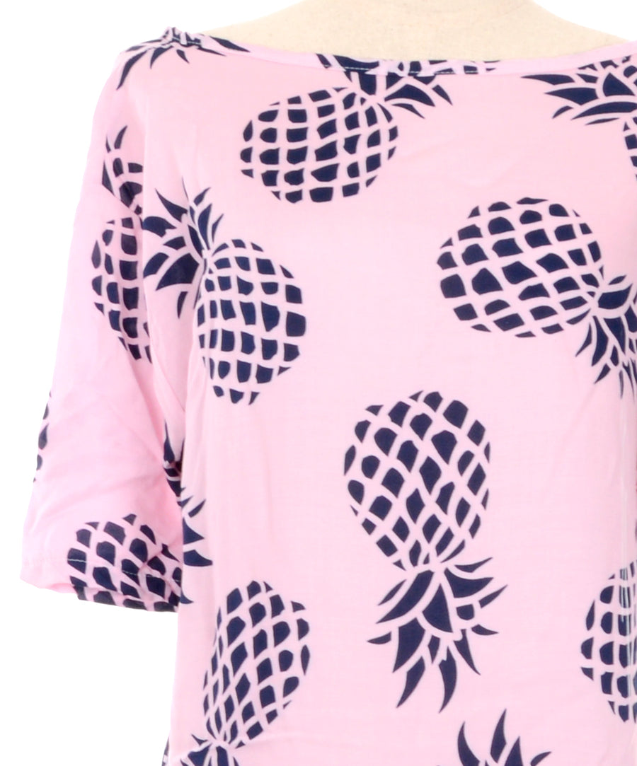 Lenge, nyári tunika rózsaszín alapon kék ananász mintával.